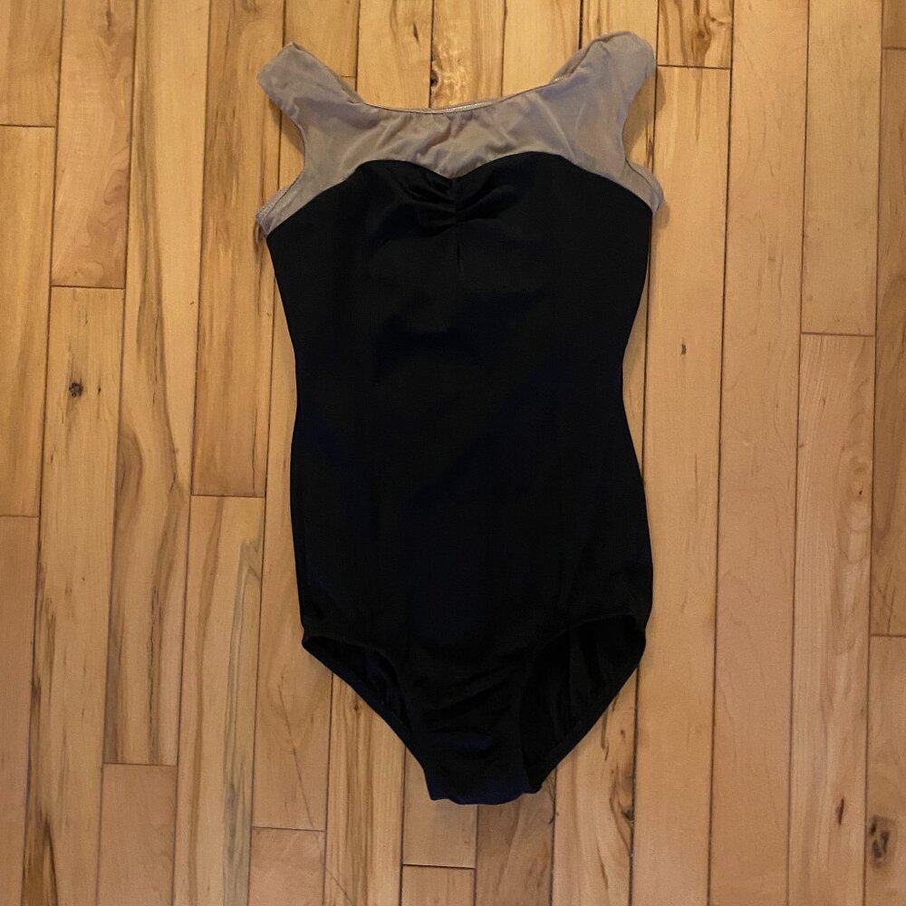 Black Natalie leotard with mesh sleeves.